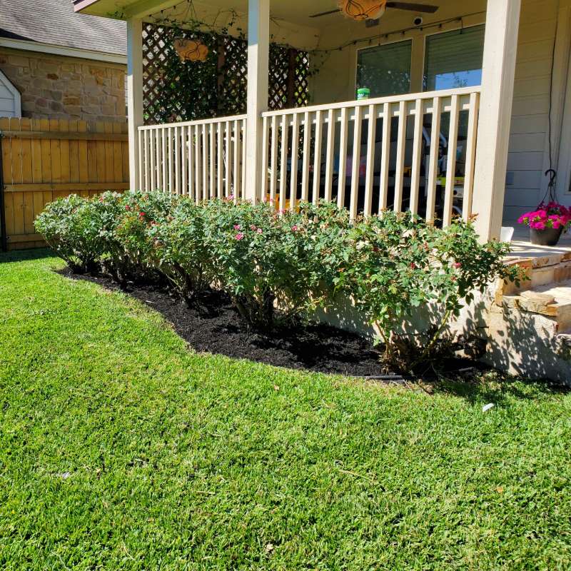 Foundation planting bed along a porch